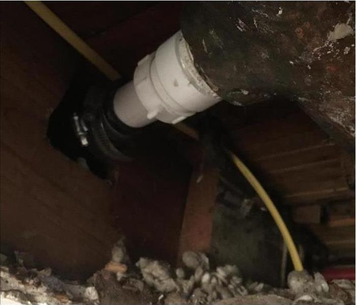 Leaking pipe in ceiling